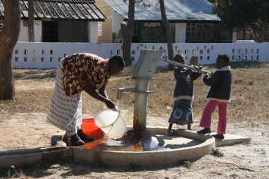 A rural hand pump used for community water access